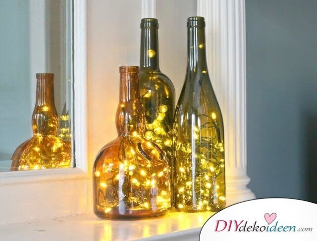 DIY Weihnachtsdeko Bastelideen mit Weinflaschen, Lichterketten in Weinflaschen, Leuchtende Weinflaschen