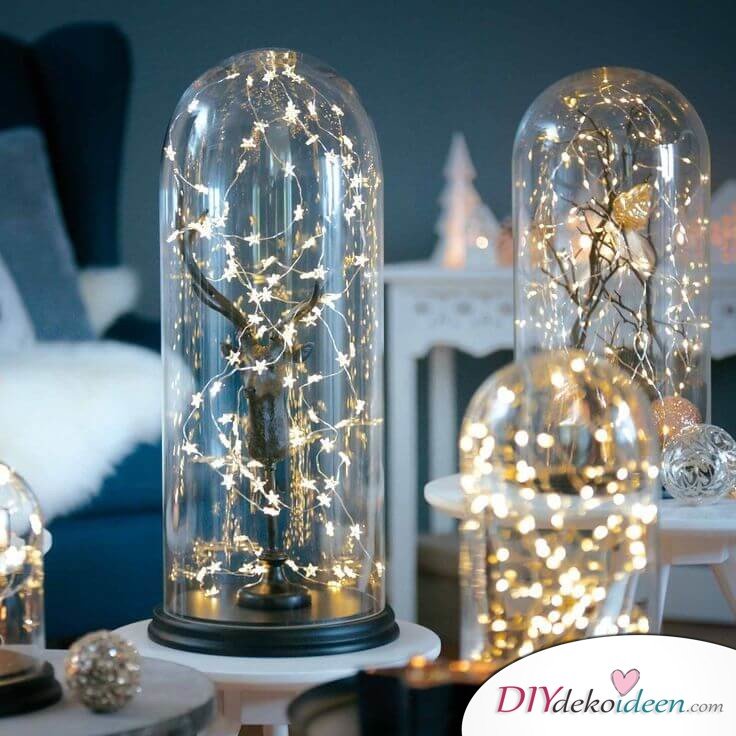 Weihnachtsdeko Ideen mit Lichterketten-Glasvasen leuchtend dekorieren