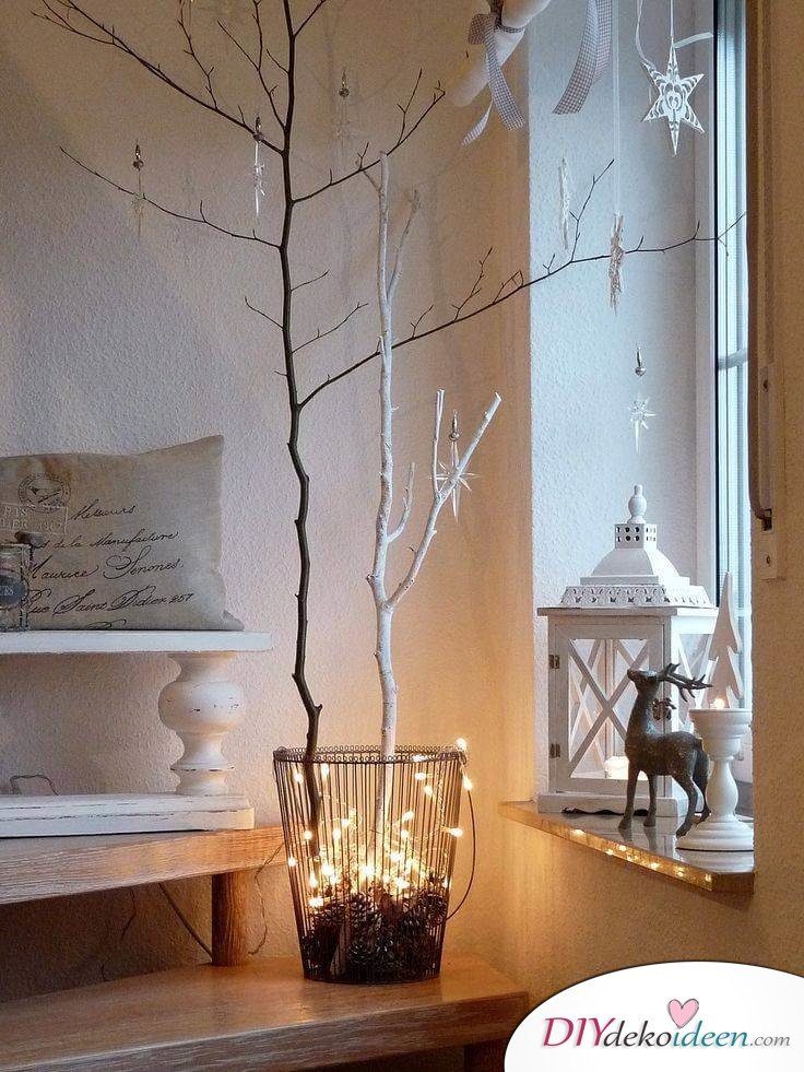 DIY Weihnachtsdeko und Bastelideen zu Weihnachten, skandinavische Deko, Äste schmücken mit Papierdeko und Lichterketten