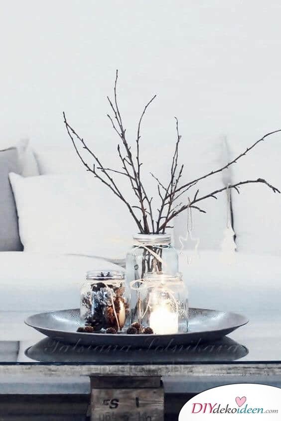 DIY Weihnachtsdeko und Bastelideen zu Weihnachten, skandinavische Tischdeko mit Kerzen, Zweige schmücken