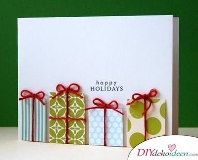 Weihnachtskarte schreiben mit Geschenkschachteln